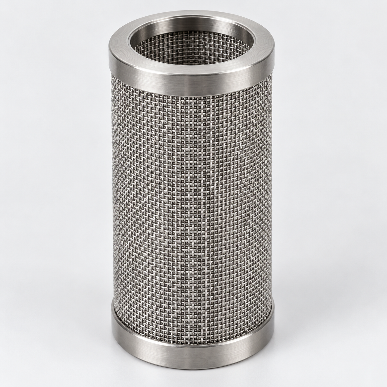 Configurazione illustrativa di cartuccia idraulica in rete inox tessuta con anelli terminali, per olio idraulico e lubrificante