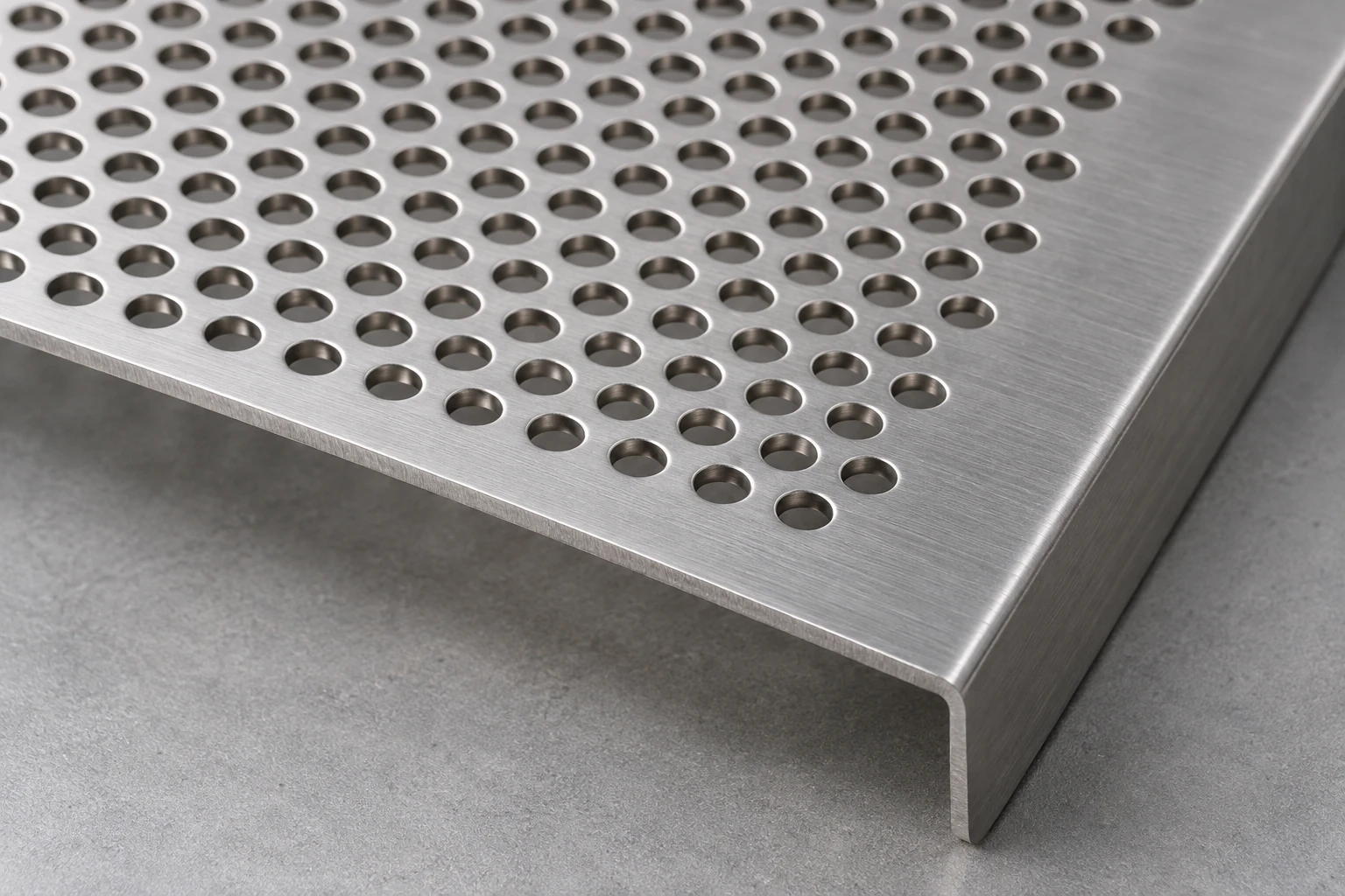 Illustrative perforated-sheet construction. The image does not establish material grade, dimensions or installation approval.
